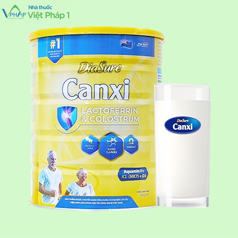 Lon và ly sữa DiaSure Canxi