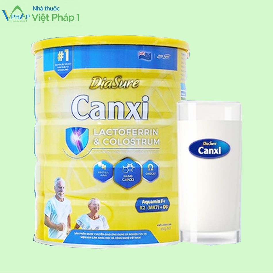 Lon và ly sữa DiaSure Canxi